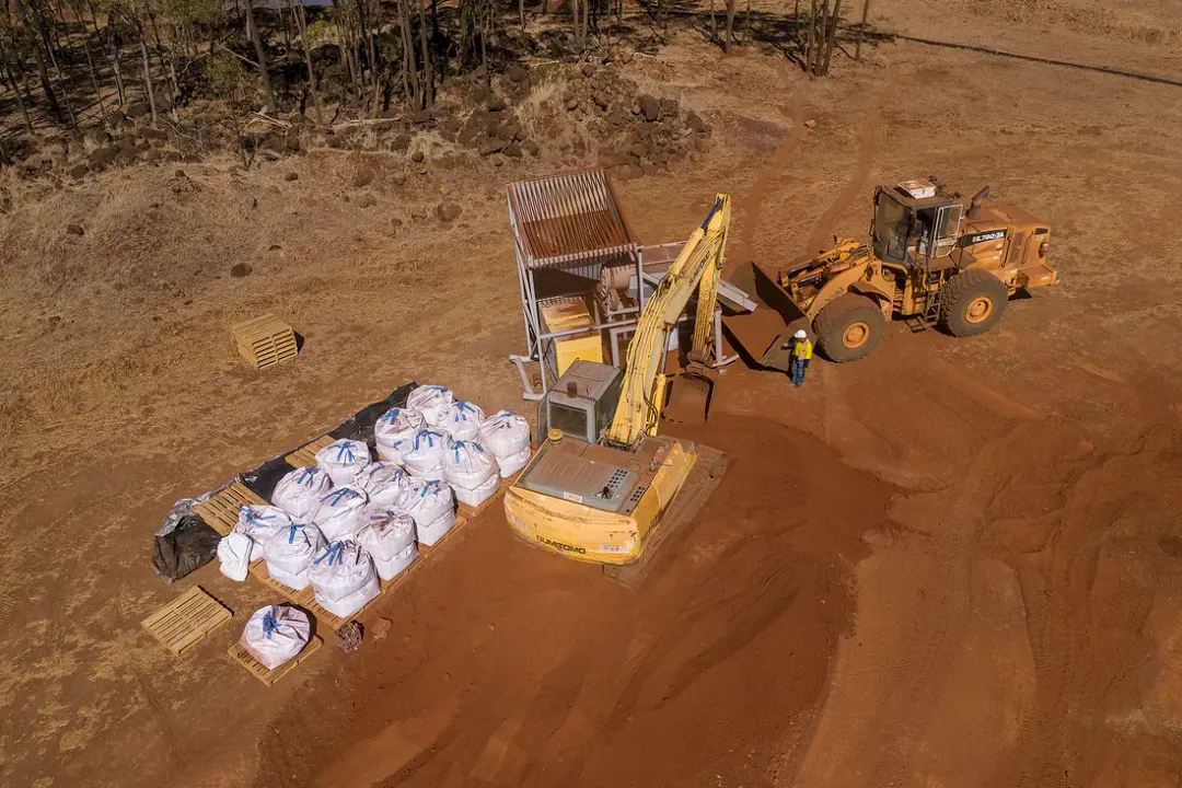 Mine tailings being excavated and bagged on site